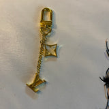 Authentic LV with Star Quatrefoil Purse Charm/Keychain