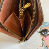 The Junco Zippy Wallet - Vintage Monogram