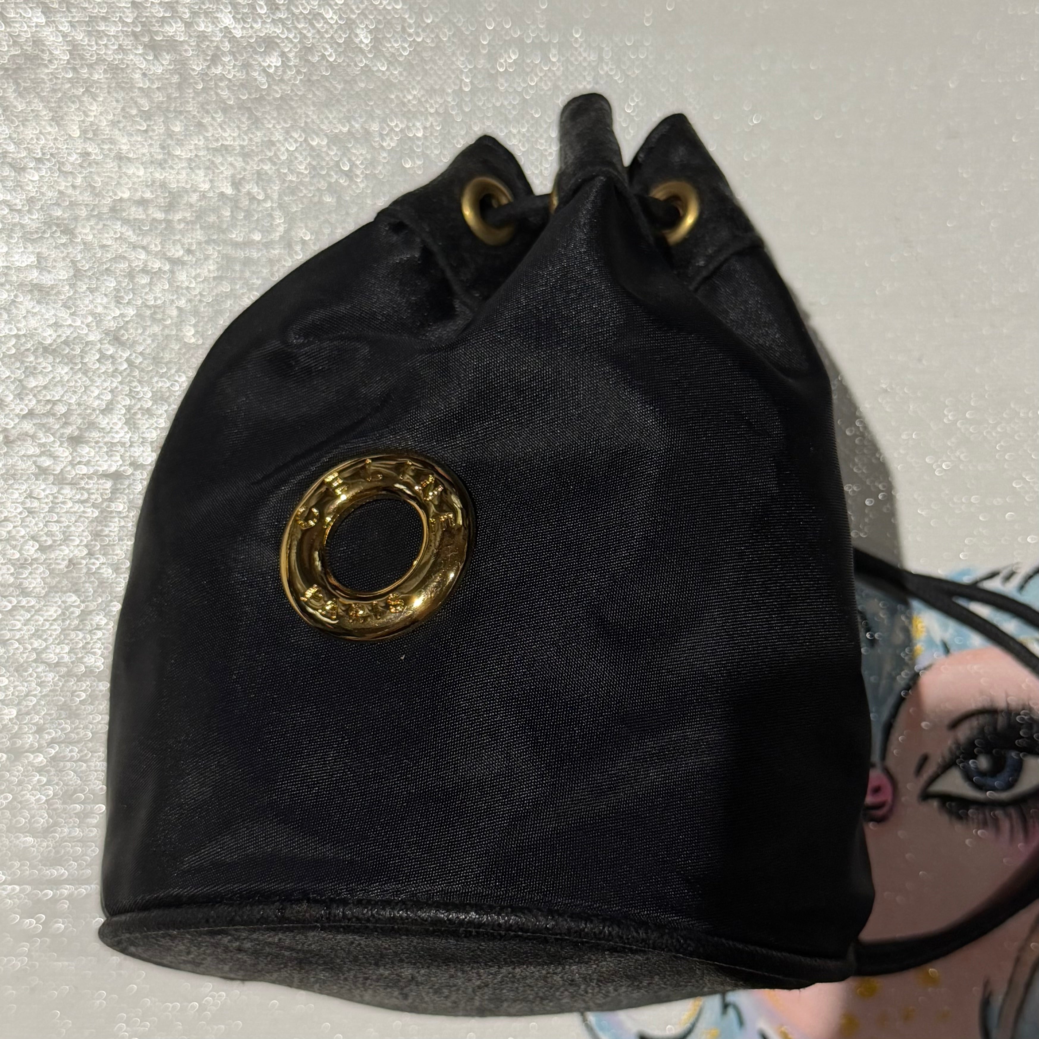 The Junco Drawstring Bag - Black CELINE