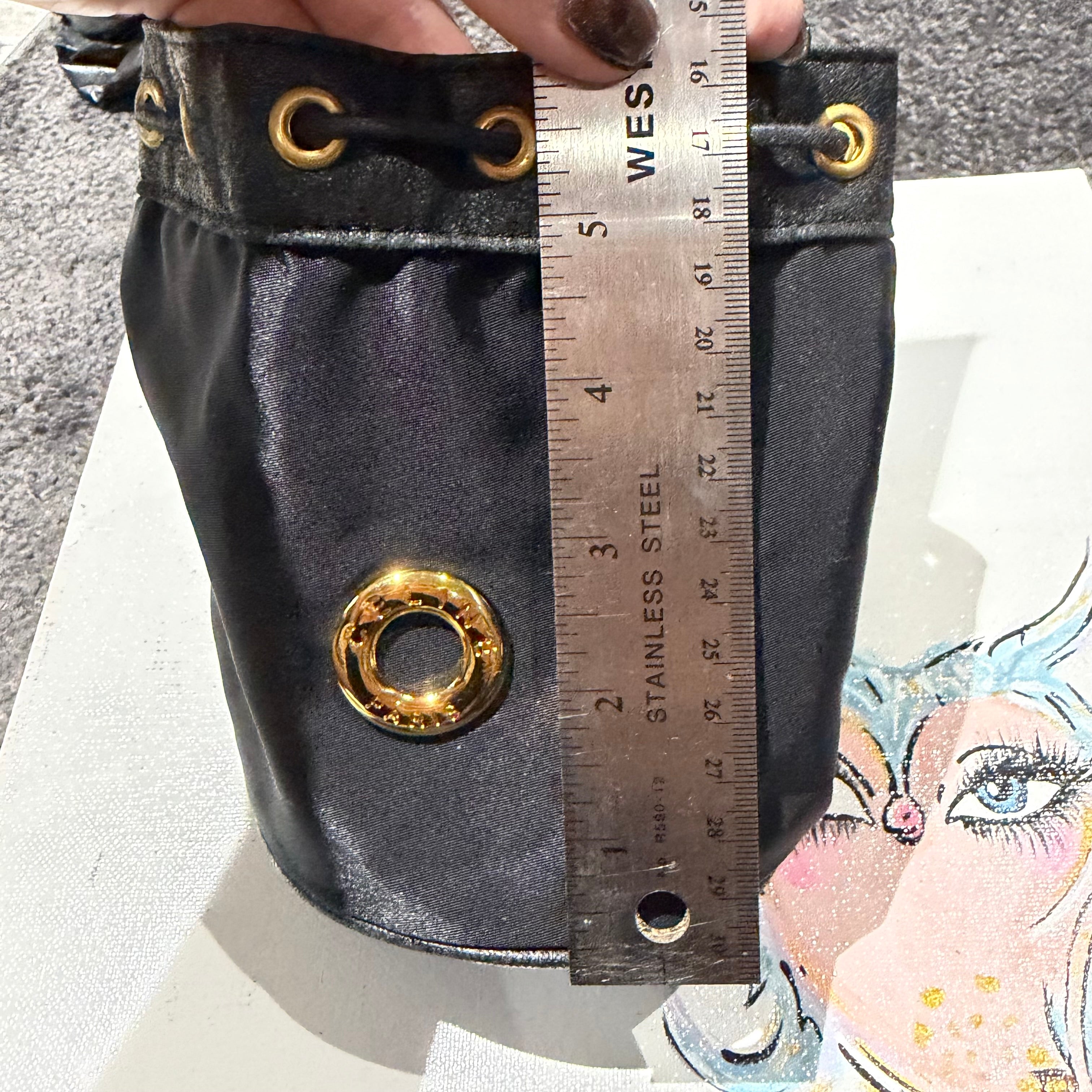 The Junco Drawstring Bag - Black CELINE