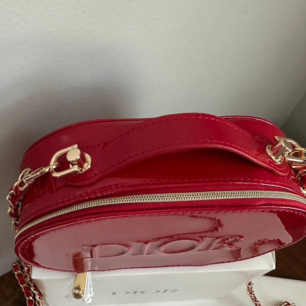 The Junco Crossbody Bag - Oval Dior in Red