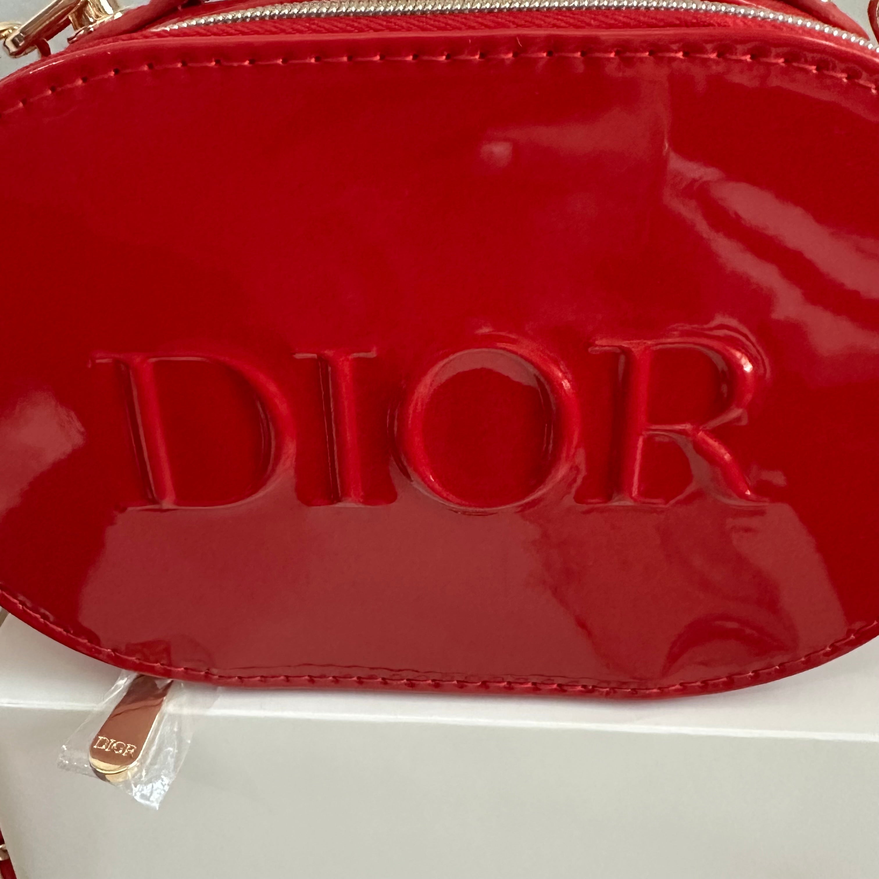 The Junco Crossbody Bag - Oval Dior in Red