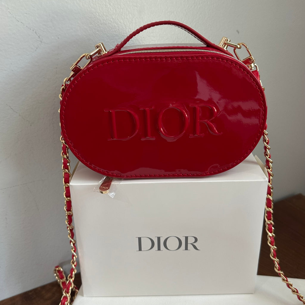 The Junco Crossbody Bag - Oval Dior in Red