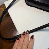 The Junco Crossbody - Black Shearling Leather Coach