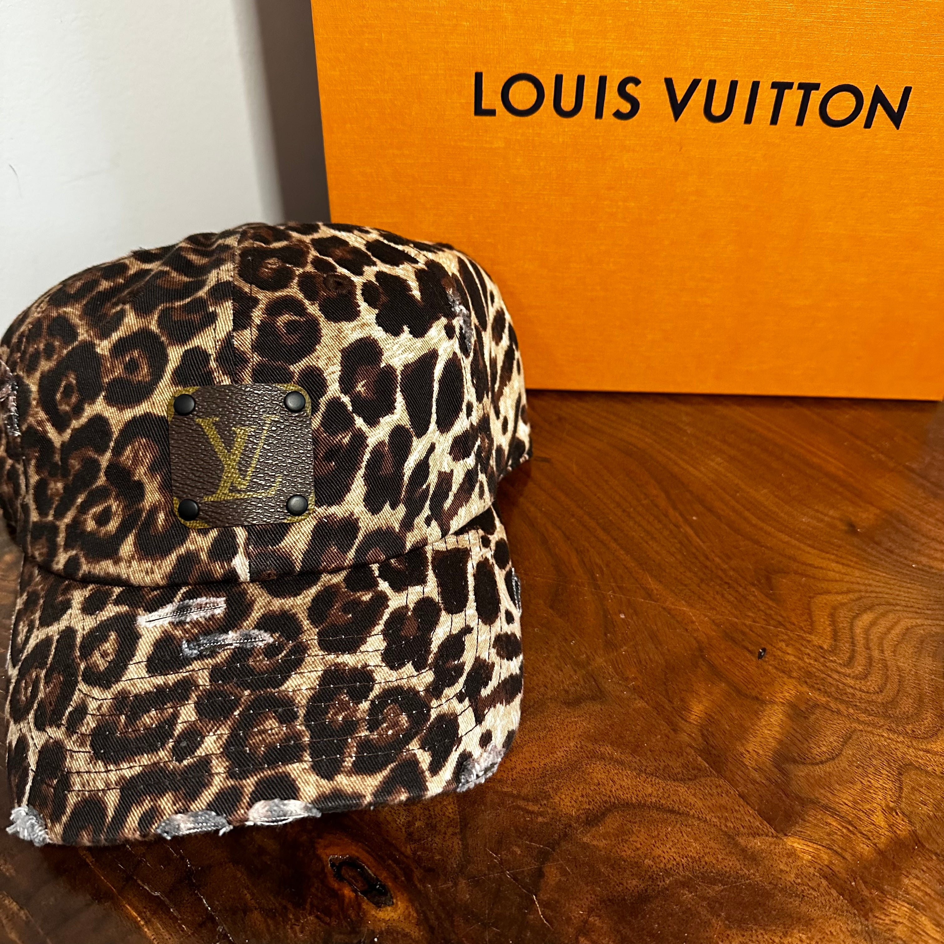 Upcycled LV Patch on Distressed Leopard Print Hat