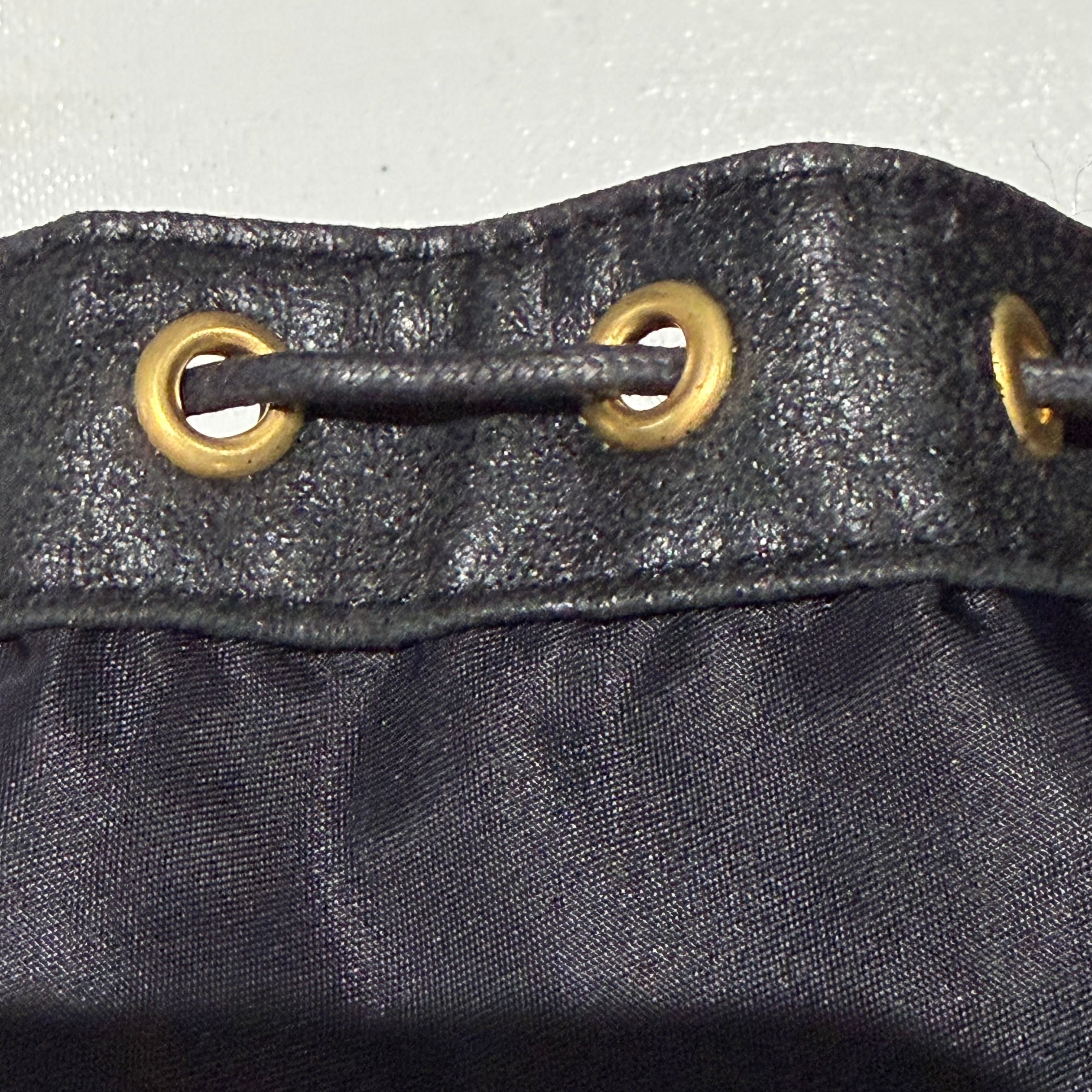 The Junco Drawstring Bag - Black CELINE