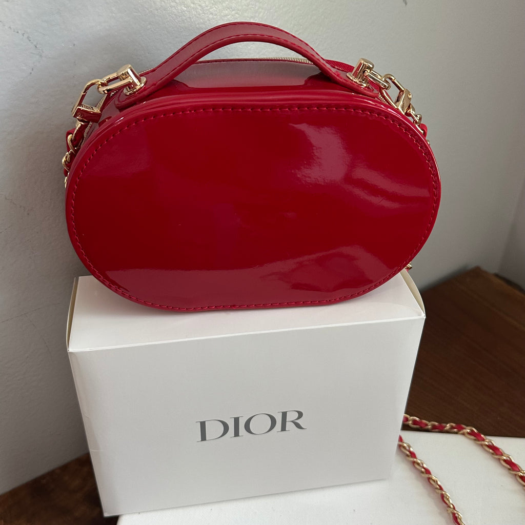 The Junco Crossbody Bag - Oval Dior in Red