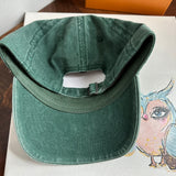Upcycled LV Patch on Washed Forest Green Hat