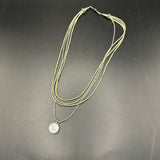 GG Pendant on Multi-Strand Pale Green Necklace