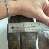 The Parrot Crossbody - Monogram in Brown