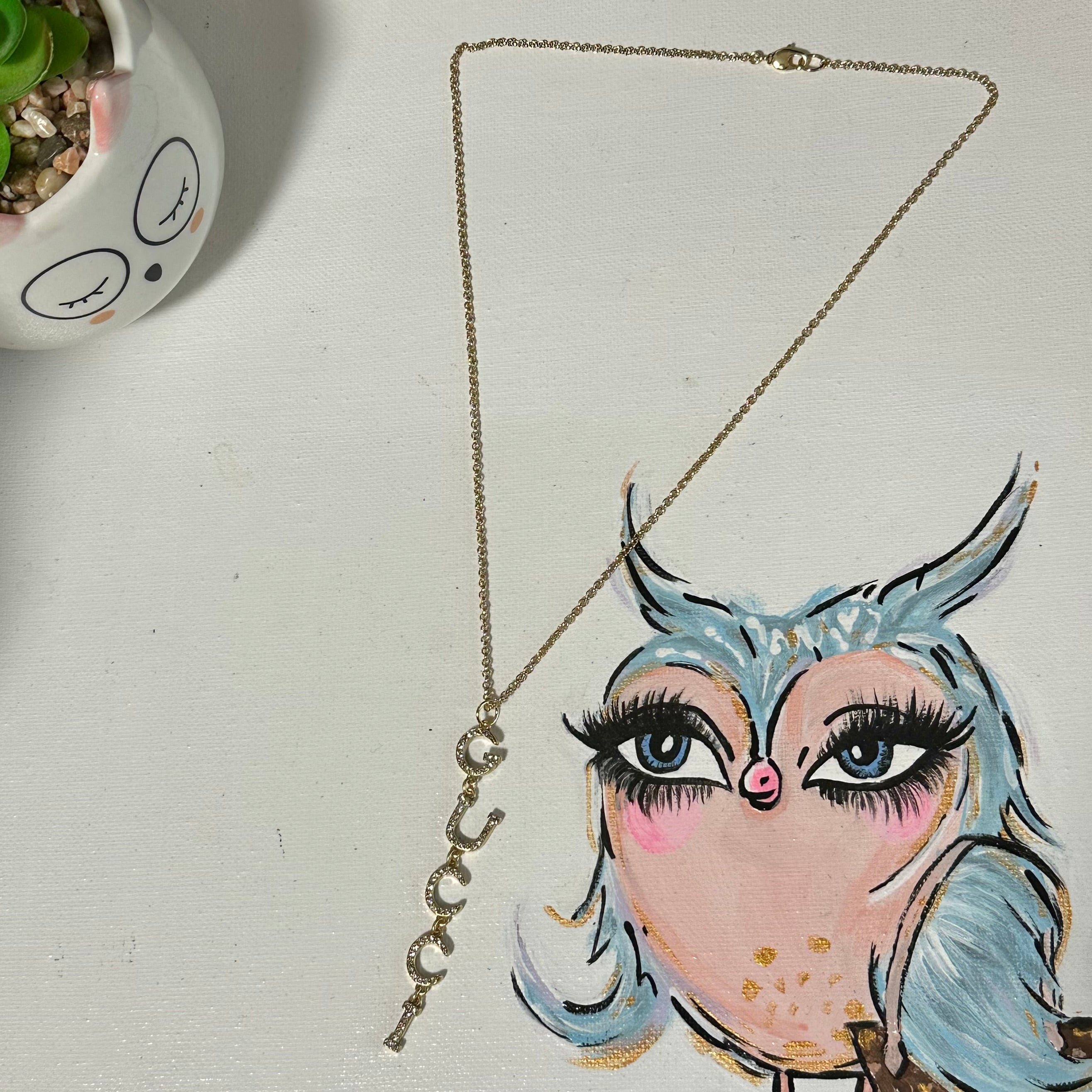 Gucci lariat necklace