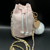 The Junco Crossbody Drawstring Bag  - Pale Pink Dior