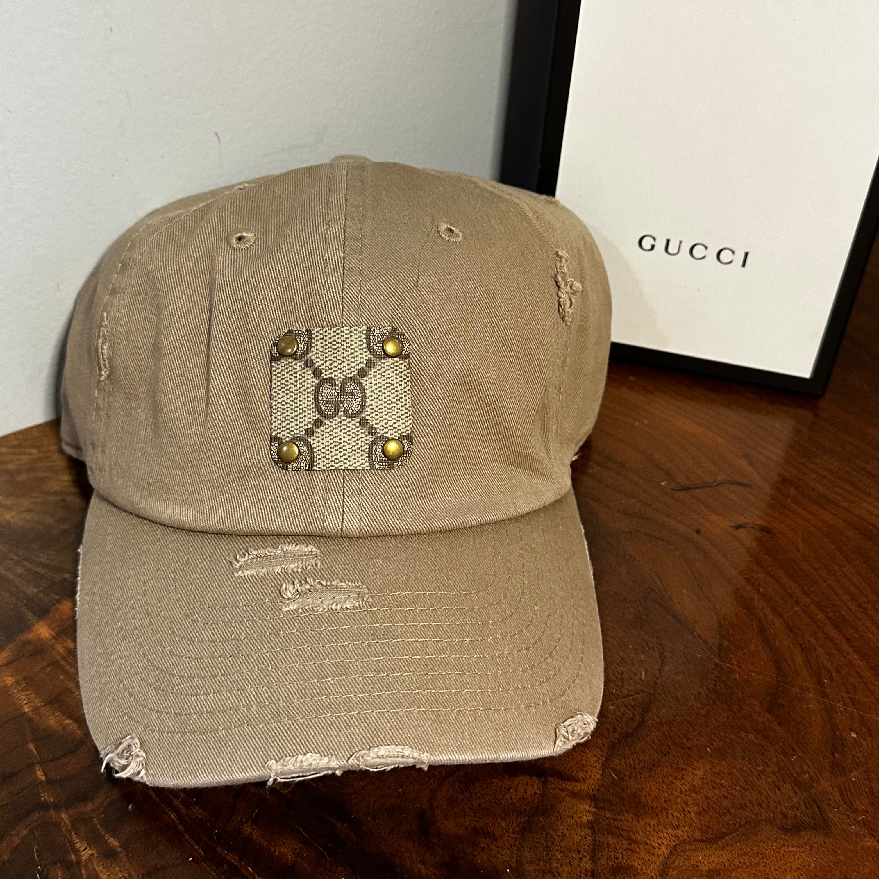 Upcycled Brown GG Patch on Distressed Tan Hat