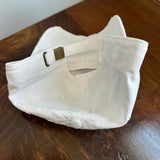 Upcycled LV Patch on Distressed White Hat