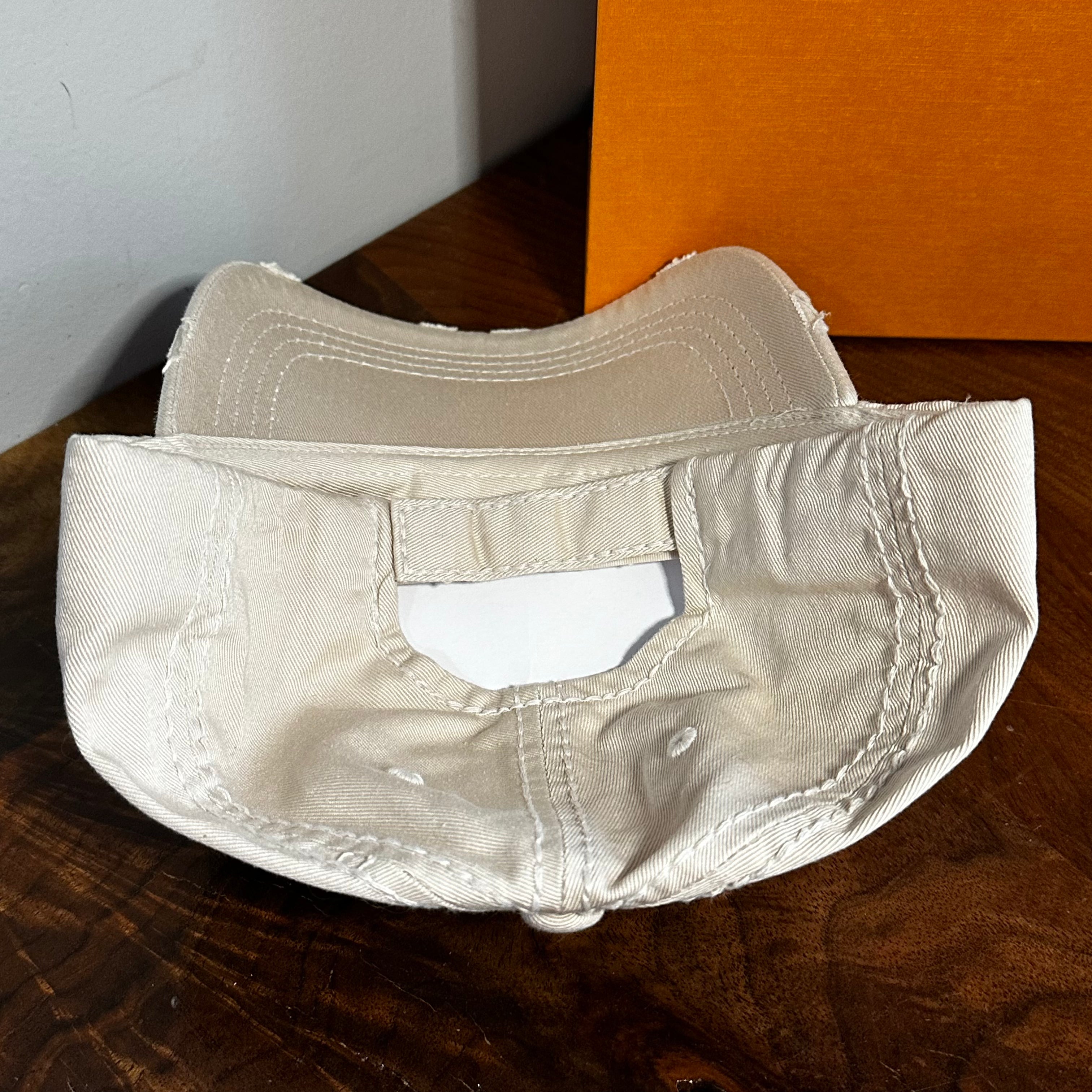 Upcycled LV Patch on Distressed Stone-Colored (off-white) Hat