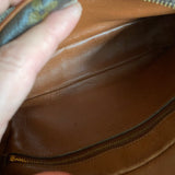 The Sparrow Crossbody Bag in Tan Monogram