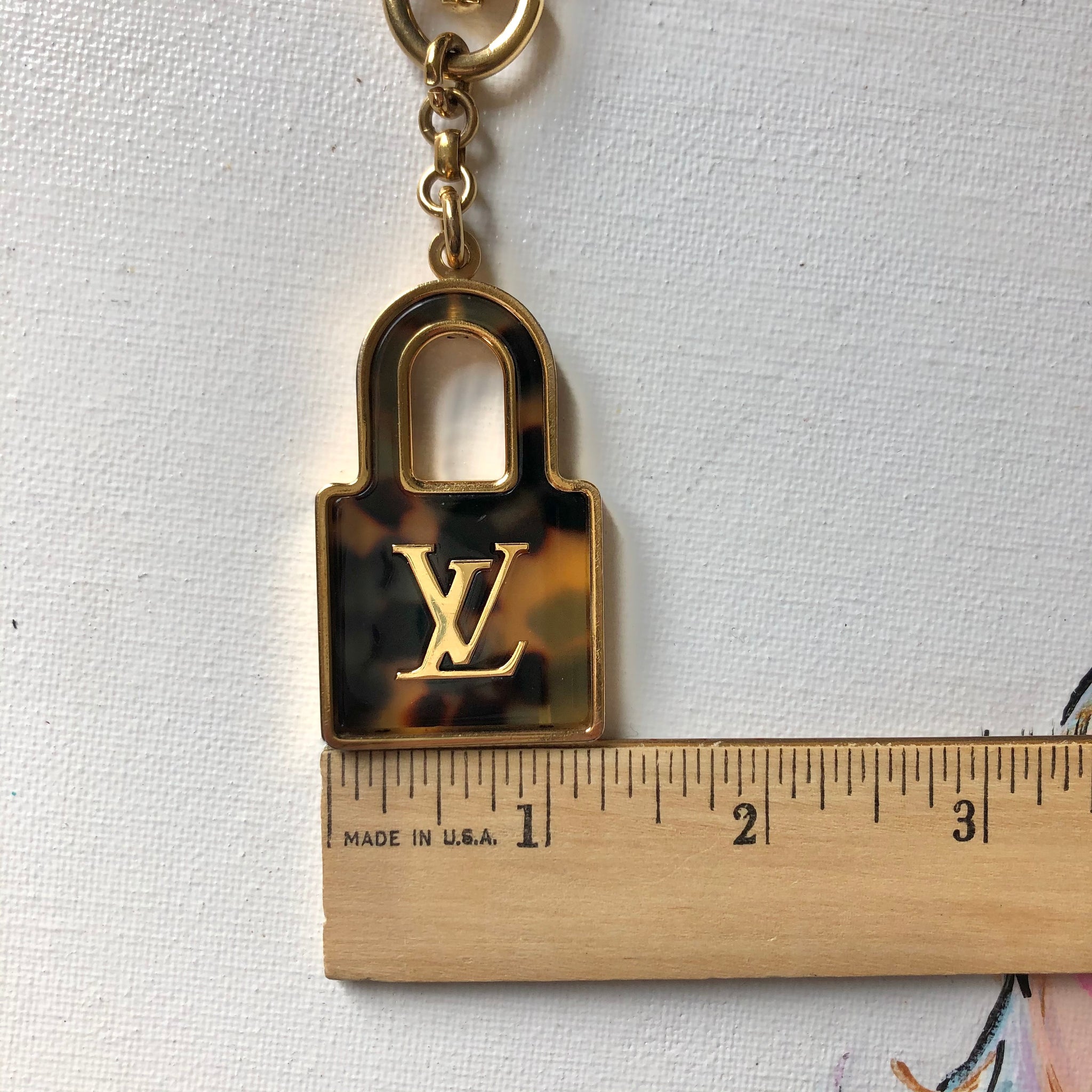 Authentic LV Tortoise Shell Padlock Purse Charm/Keychain – Beauty Bird  Vintage