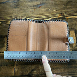 The Junco Bi-fold Short Wallet - Vintage Monogram in Chocolate