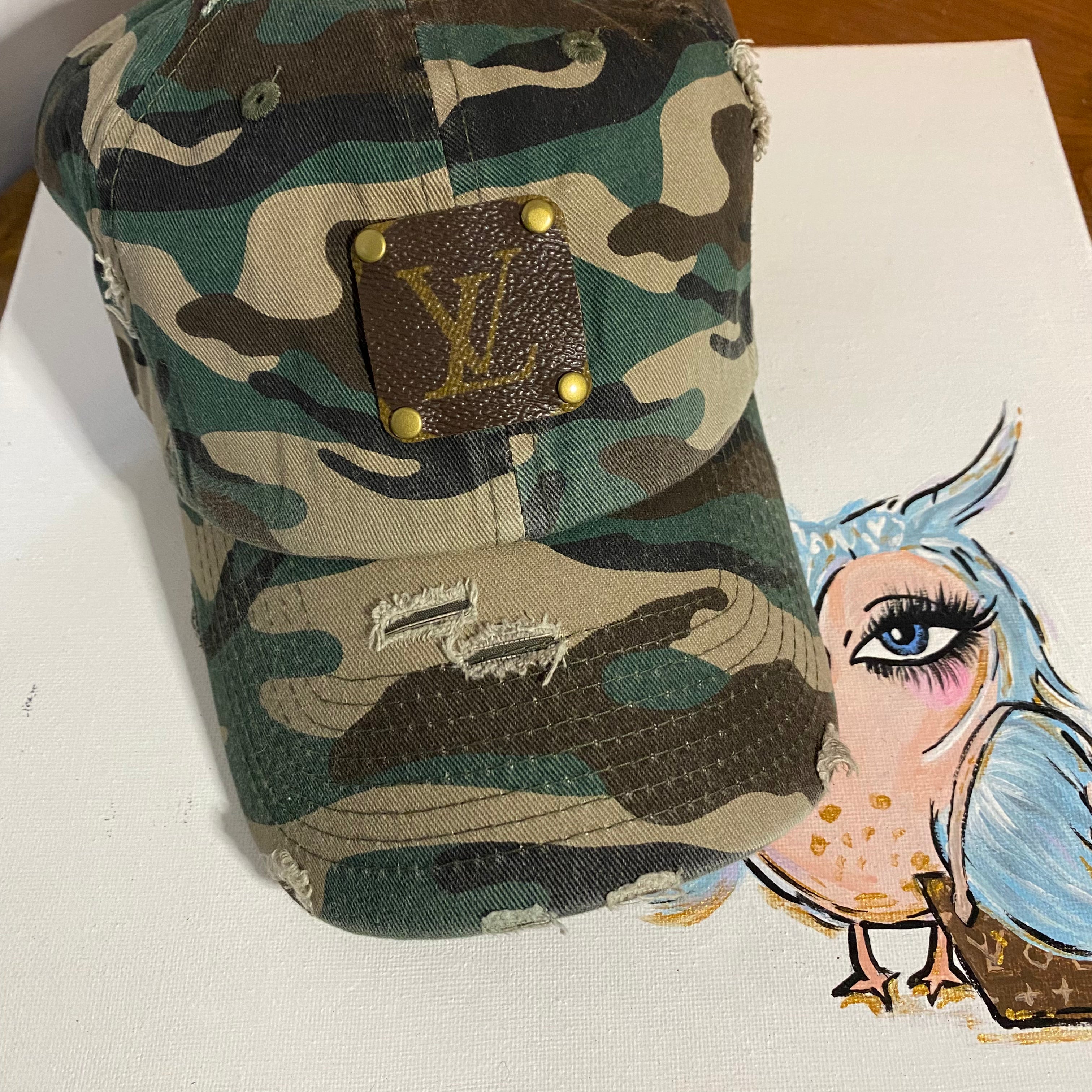 Upcycled LV Patch on Distressed Camo Hat